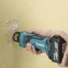 Makita DCO180Z 18V Cordless Drywall Cutout Tool In Use